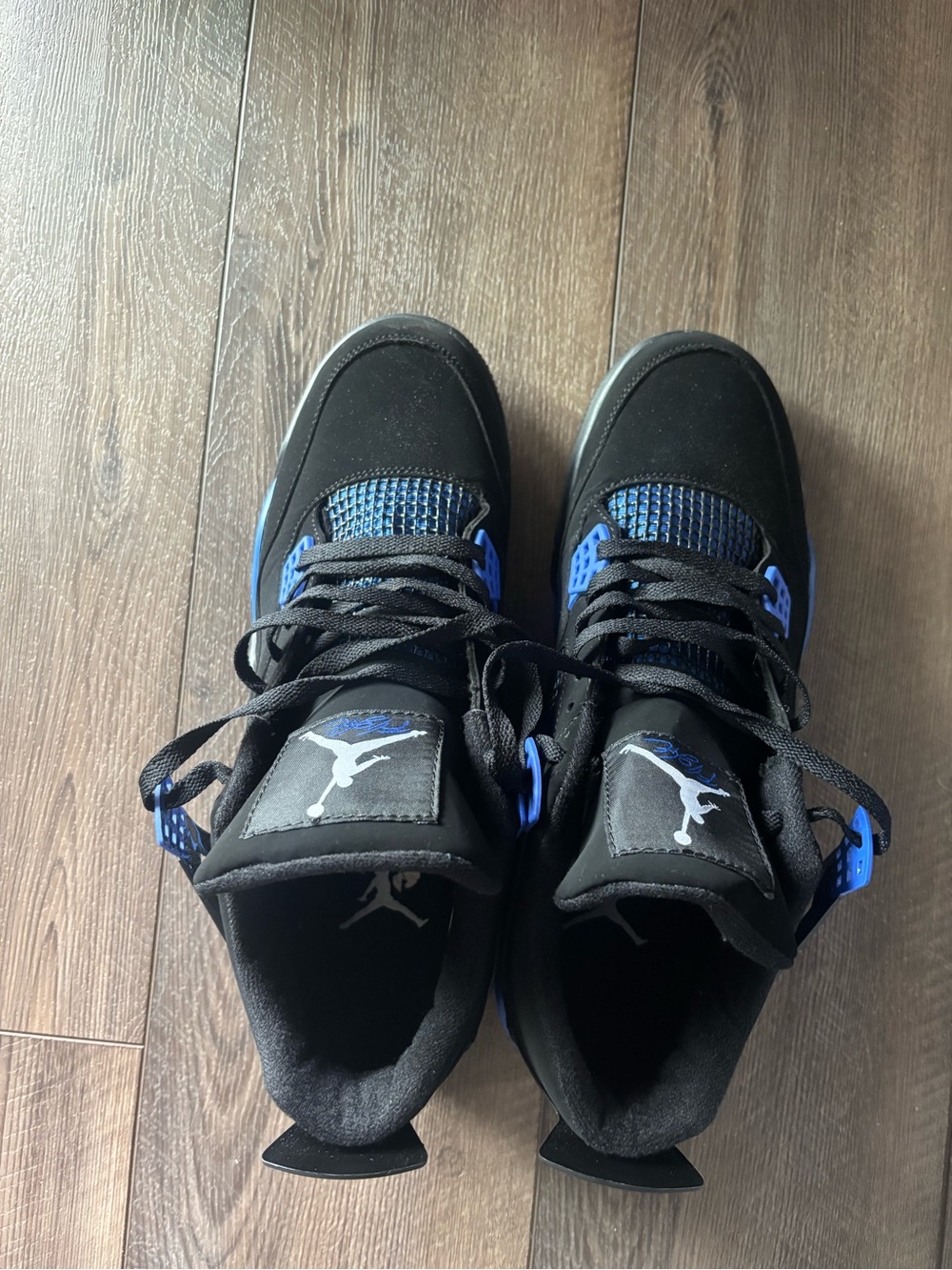 Jordan 4 Black and Blue sneakers